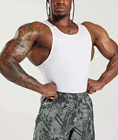 Maximize your workout with our stringer tank tops. Designed for optimal comfort and mobility, this tank allows for a full range of motion during any exercise.